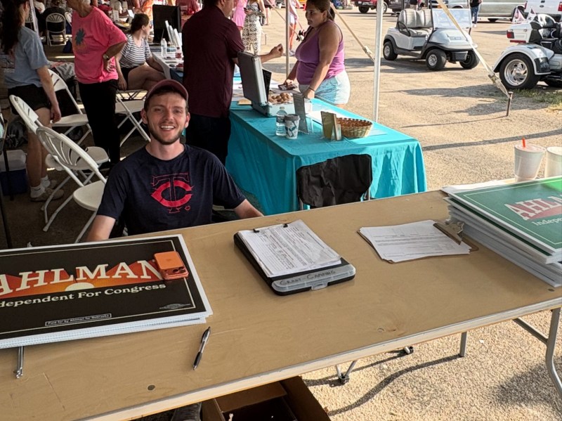 Austin Ahlman, Independent candidate for US House in Nebraska's 1st District, mans his own booth on June 8, 2026 | Photo: Ahlman for Nebraska Facebook Page
