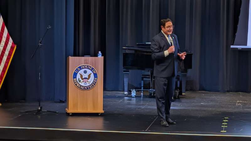 Nebraska 1st District Rep. Mike Flood stands before the crowd during a public town hall event hosted in Bellevue, Nebraska, on Tuesday, June 7, 2026. | Photo: Chase Porter/Courier Nebraska