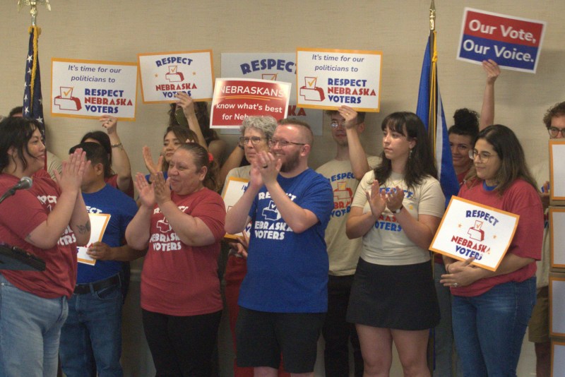 Supporters of the Respect Nebraska Voters ballot campaign applaud Thursday, July 2, during a press conference announcing the group gathered over 186,000 signatures to make the November ballot. | Photo: Chase Porter/Courier Nebraska