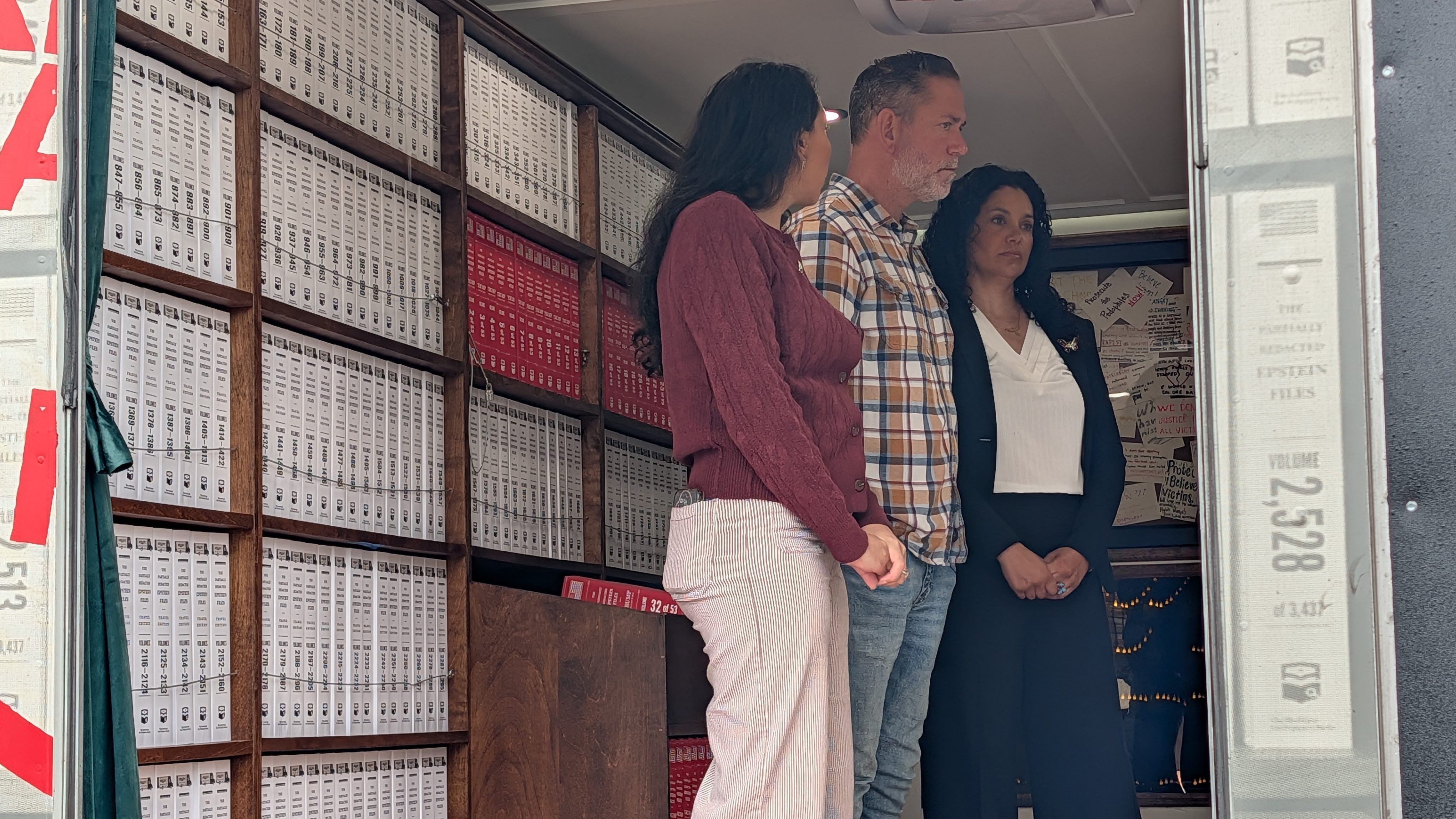 Dan Osborn, Independent candidate for US Senate in Nebraska, listens to survivors of the Jeffrey Epstein's sex trafficking operation while he tours the "Donald J. Trump and Jeffrey Epstein Memorial Bookmobile" during its stop in Omaha, Nebraska, on Sunday, Sept. 13, 2026. | Photo: Chase Porter/Courier Nebraska