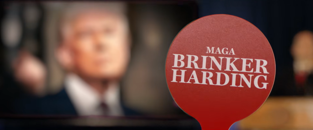 A frame from a new campaign ad by Denise Powell, the Democratic nominee in Nebraska’s 2nd Congressional District, portraying her Republican opponent, Brinker Harding, as “MAGA” — short for “Make America Great Again,” President Donald Trump’s signature campaign slogan. | Courtesy of Powell for Congress