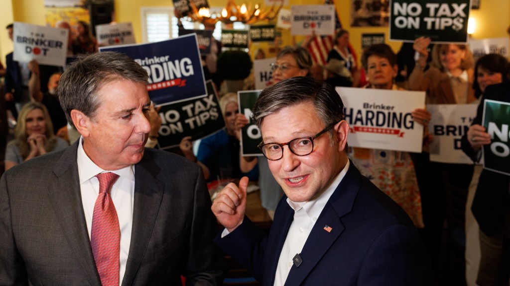 U.S. House Speaker Mike Johnson of Louisiana and Brinker Harding, Republican candidate for Nebraska's second congressional district, talk with reporters during a campaign event in Omaha, Neb. on Saturday, July 18, 2026.(Nikos Frazier/Omaha World-Herald via Getty Images)