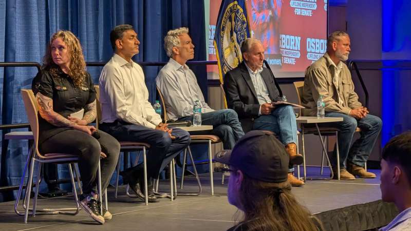 From left: Rachael Nelson, former chair of the Nebraska Libertarian Party; U.S. Rep. Ro Khanna (D-Calif.); former U.S. Rep. Joe Walsh (R-Ill.); former Republican National Committee Chair Marc Racicot; and Dan Osborn, an independent candidate for U.S. Senate in Nebraska, at a “cross-party” town hall in Omaha, Neb., on Saturday, Oct. 24. Photo: Chase Porter/Courier Nebraska.