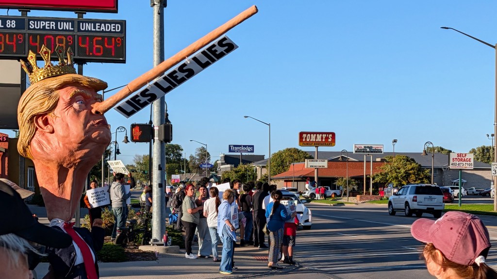 About 200 counterprotesters demonstrated outside the venue hosting President Donald Trump's rally stop in Grand Island, Nebraska, on Oct. 5, 2026. | Photo: Chase Porter/Courier Nebraska