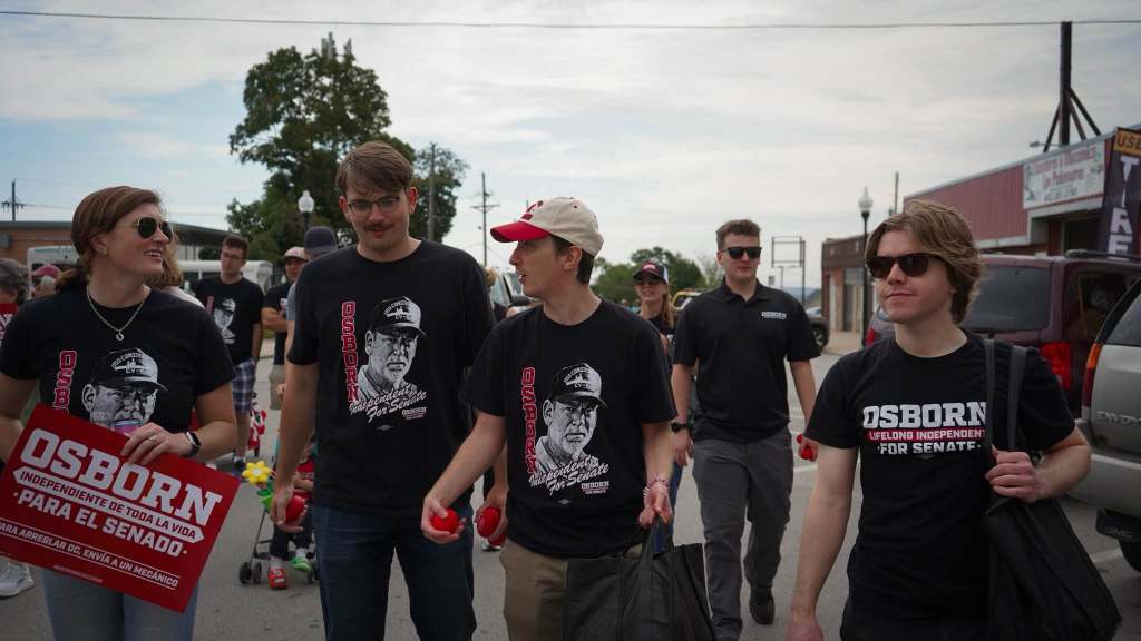 Campaign staffers and volunteers participate in parade for Dan Osborn, Independent candidate for US Senate in Nebraska. | Photo: Osborn for Senate campaign